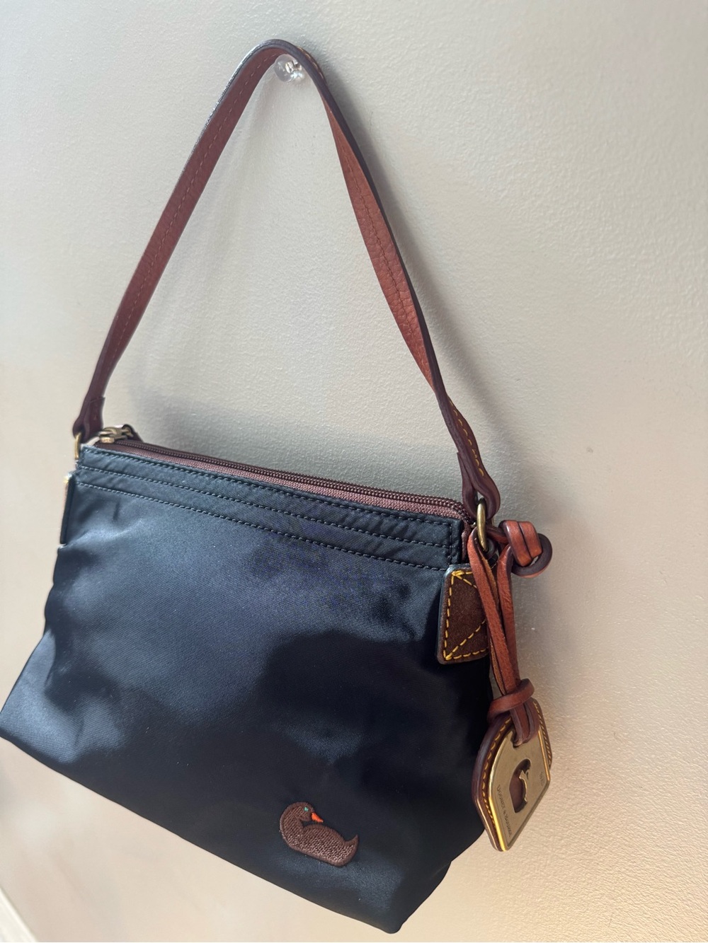 Dooney & Bourke Black Nylon Mini Bag with Brown Leather Trim